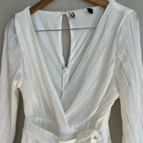 Embrace Your Beauty Ivory Pleated Long Sleeve Skort Romper - Picture 8 of 9